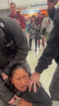 ICE agents restrain woman in front of her child at SFO, sparking outrage