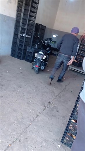 Exploring a Warehouse Full of Crates and Motorcycles