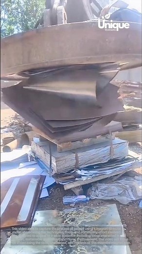 Moving metal: people using a magnet to move metal