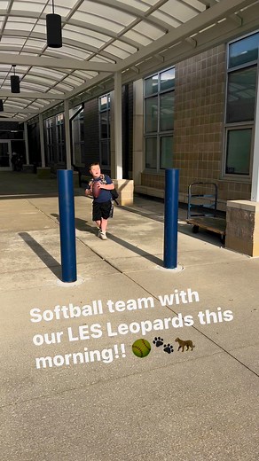 Our softball team welcoming LES students to school this morning... and having some fun too! 🩵 | Louisville City Schools (Louisville, OH)