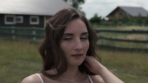 Portrait of a beautiful brunette girl looking at the camera
