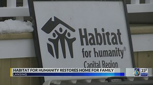 Habitat for Humanity restores home for family in Lansing