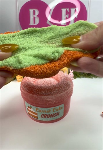 Hey, besties! It is drop week and we can’t wait to share all of our new Spring-inspired creations with you. Dreaming of Spring drops this Friday at 5 PM CT! It already feels like Spring here. The high today was 82! Does anyone have any fun Spring travel plans? Sweet, crunchy, and full of springtime charm, Carrot Cake Crunch is a dessert-inspired slime that’s almost good enough to eat. The base is a carrot-orange microfloam x slushee bead blend that creates the perfect crunchy look, topped with a