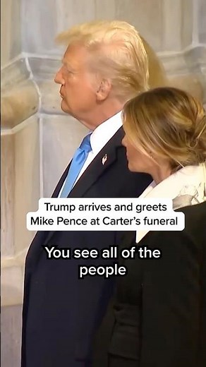Trump arrives and greets Mike Pence at Carter's funeral
