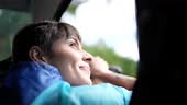 Young woman enjoying a road trip