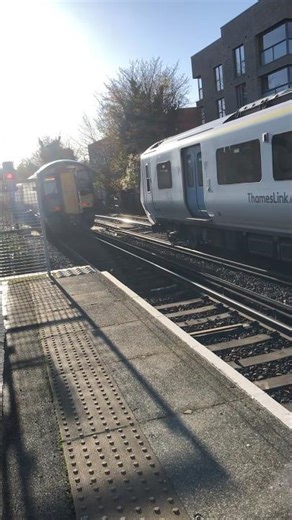 Class 375 leaving Rochester while a class 700 arrives.