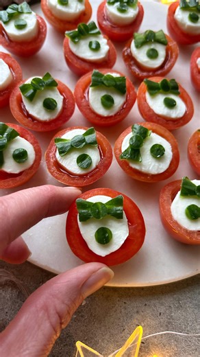 Sine Siemkowicz on Instagram: "Cherry Tomato Appetizers 🤵🏻 Celebrate the NEW YEAR with these adorable cherry tomato bites. Yum! Comment ‘New Year’ for more ideas! Cut the butterflies by hand or with a star cookie cutter like I did. Use cucumber peel, avocado, cheddar cheese, spring onion, or chorizo! There are so many ways to adapt these! Hope you like them. #newyearsfood #foodart #partyfood #newyearseve appetizers #fingerfood"