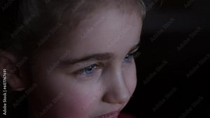 Child Watching TV, Close up Face of Little Girl, Kid Eyes. Portrait Laughing Kid While Watching TV. Girl Watch Television on Living Room. Concept Video Game, Entertainment, Emotions, Streaming Tv.