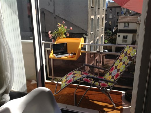 No Balcony Space? This Table Hooks On as a Planter, Bar, or Desk - Yanko Design