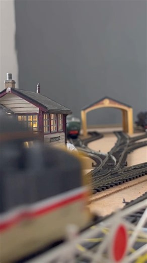 Class 37 speeds past Benchester signal box with passenger