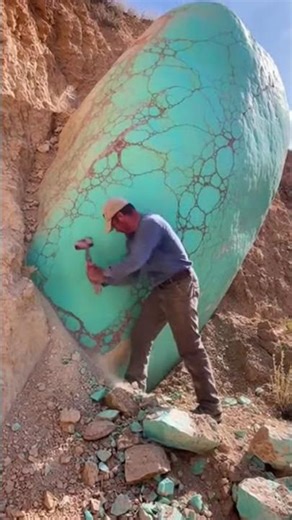 Working to Extract a Giant Natural Turquoise Boulder