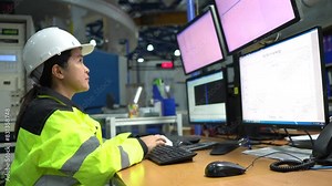 Computer Engineer Working in a Large Industrial Factory, Using Programming Software to Control Machinery and Develop Systems for Automation and Efficiency Improvement,work at server