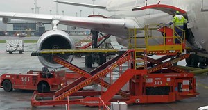 Download Cargo loading into the airplane luggage hold