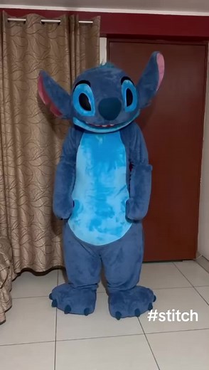The Stitch mascot costume, inspired by Lilo & Stitch, features his signature blue fur, large ears, and playful smile, perfect for events, cosplay, or promotions. Made with durable, breathable materials and a padded interior for comfort, it ensures easy wear. Available for international shipping, it includes secure packaging, tracking, and customs support for safe delivery worldwide. #costumeshalloween #disney #disneyland #stitch #liloandstitch #viral_video #fyp #costume #stitchmascotcostume #mas
