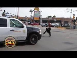 Man on PCP challenges police vehicle in South Los Angeles before being arrested