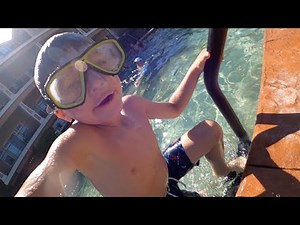 Practicing Swimming & Jumping in the Pool