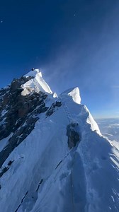 Walking the knife-edge between earth and sky. The summit ridge - where every step is a dance with the wind, and the summit feels just within reach 🎥: Nani Stahringer #adventureawaits #everest #hikingadventures #mountainlife #mountaineering #expeditions #climbingworldwide #mountaineeringlife #climbing #neverstopclimbing #14x8000 #8000ers #expeditionlife #8000m | Alpine Ace Treks & Expedition