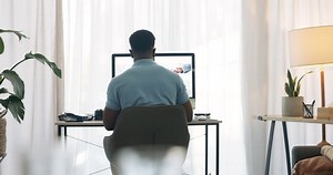 Business, designer and computer with freelance design expert typing while working at home. Ux, remote worker and entrepreneur web designer writing an email or designing a website homepage