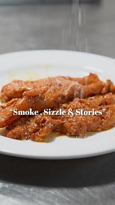 Smoke signals rise from sizzling grills, telling tales of far-off...