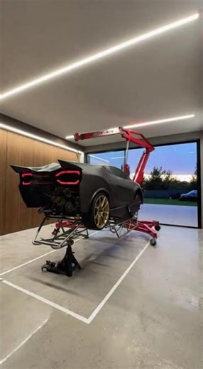 Building a Custom Sports Car in a Garage Carbon Fiber Body and Engine Detail 2