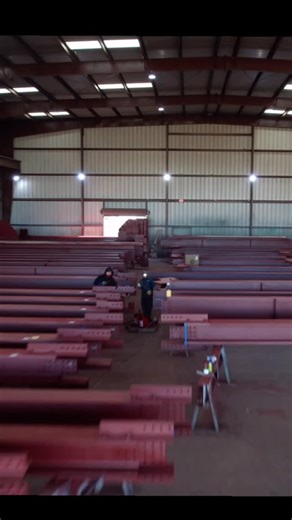 Rolling Plains Construction on Instagram: "Our process starts before the first spray. Steel arrives at our facility and undergoes meticulous surface preparation—removing mill scale, rust, and contaminants that compromise adhesion. Our team applies fireproofing materials with precision and care, understanding that every beam, column, and structural element plays a critical role in building safety. This is more than a job. It’s a commitment to quality that protects what matters most—the people who