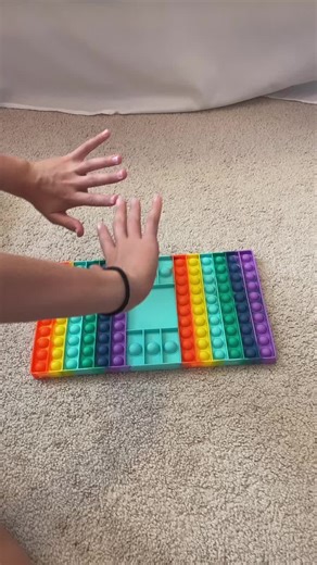Satisfying Pop-It Toy Interaction with Vibrant Colors