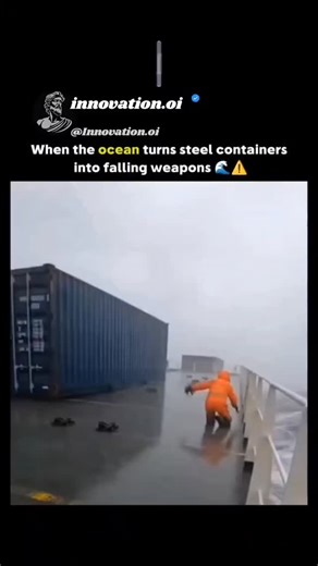 innovation.oi on Instagram: "The post features a 10-second viral video of a cargo ship worker in an orange survival suit slipping on a stormy deck as a massive blue container tips over, narrowly missing crushing him against the railing. Viewer reactions, including 72 replies, focus on the improbable survival, with comments like "I can't believe he survived" reflecting the clip's heart-stopping tension and 33,000+ views in hours. Such incidents highlight seafaring risks; ILO data from 2023 record