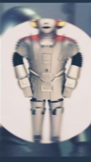 Twiki the little drone robot 🤖 with Dr Theopolis ( another robot Twiki wears on chest)—-1979