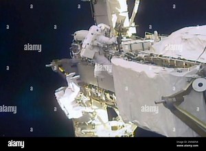 In this image taken from NASA video, French astronaut Thomas Pesquet, bottom left, and NASA astronaut Shane Kimbrough work outside the International Space Station on Sunday, June 20, 2021. (NASA via AP Stock Photo - Alamy