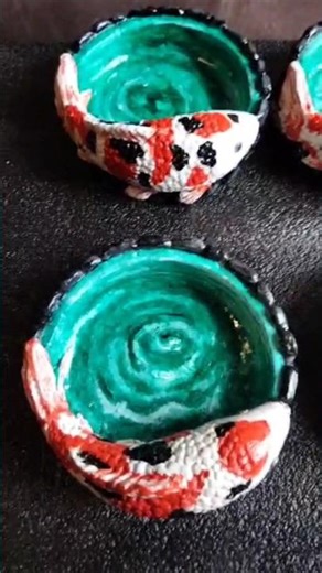 Unique crafts made of cement with koi fish models, sculpture art #koi #fish #koifishlovers