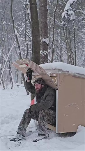 Day 2 of me camping out in my cardboard box shelter in a snow storm #fyp #camping #outdoors #snow #wintercamping