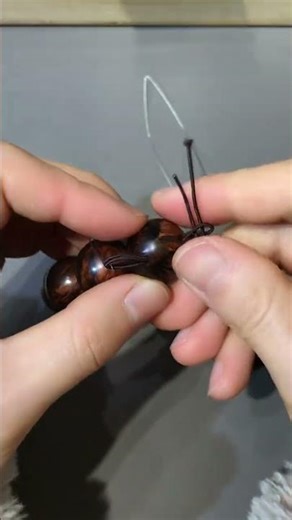 How to thread a three-way pipe through a double-strand elastic string#A cultural and