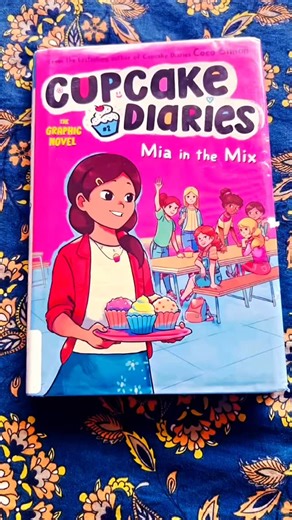 Magic of Words on Instagram: "Heartwarming yet playful graphic novel series. A perfect read for middle-graders. 📖 Mia in the Mix - Cupcake Diaries (Graphic Novels series book 2) ✍️ Coco Simon 🖨️ Simon Spotlight @simonandschuster @simonkids 🌸 Recommended for ages 8+ #bookstagram #bookrecommendations #graphicnovel #realisticfiction #middlegrade"