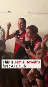 The Yeronga Devils AFL team spent over a month secretly learning their team song in AUSLAN for their teammate, who is deaf. This is the moment they surprised her in the changeroom with a belting rendition after a win. | SBS News
