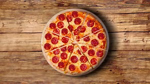 A video of the background pepperoni pizza. Footage. This picture is perfect for you to design your restaurant menus. Visit my page. You will be able to find an image for every pizza sold in your cafe or restaurant | Premium Stock Video Footage
