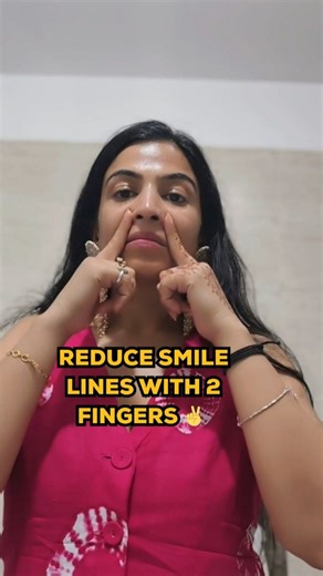 Smile freely without the fear of smile lines 🥰 This face yoga for smile lines reduction naturally is super easy and only take 2 fingers to work its magic 😁🔥 ✅Doing this facial massage once a day for 21 days will give a beautiful face without smile lines. This is how you can transform your face at home with easy facial exercise. Try it and see visible difference in just 21 days. ❤️❤️ Share this reel with everyone who has dark smile lines. #FaceYoga #NaturalBeauty #JawlineWorkout #SkinToning #G