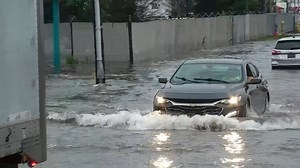 How much rain fell in Chicago? Flooded streets leave cars stranded in Illinois, Indiana