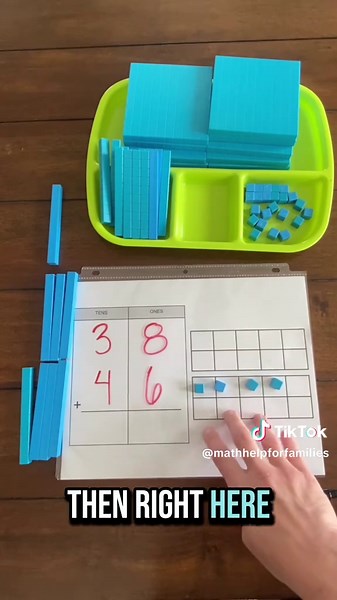 Understanding Addition with Regrouping Using Base-10 Blocks