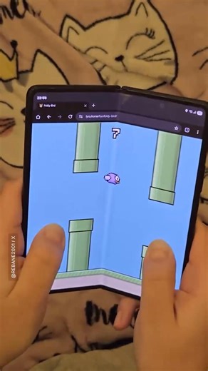 Foldy Bird is a new Flappy Bird clone for foldable phones that turns the hinge into a controller. Video: rebane2001 / X #flappybird #foldable #smartphone #technews | Digital Trends