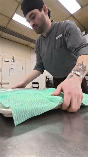An effective way to cling wrap a sheet tray.