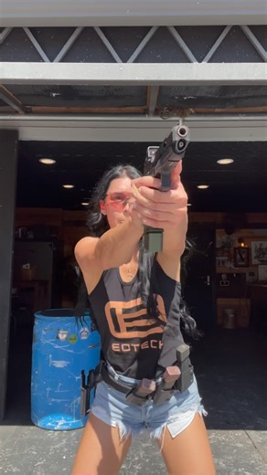 Toni McBride on Instagram: "Doin some warm-ups with my @tarantactical Glock 34 Combat Master with the @eotech E-FLX "