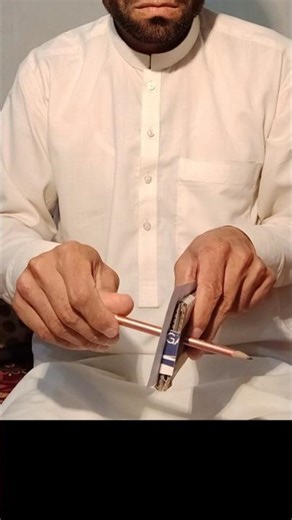 Coin Piercing Magic Trick Stick Goes Through Coin Without Damage!