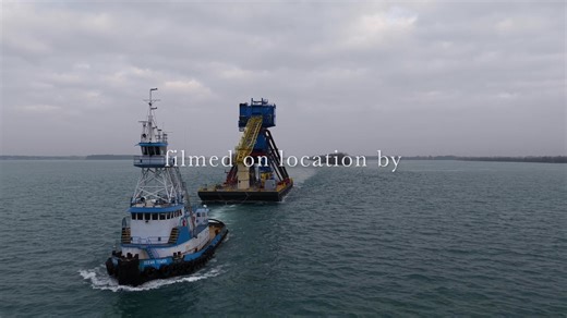 An extraordinary journey ahead for the tug Ocean Tower. We were fortunate to capture the 106-foot, 4,080-horsepower Ocean Tower tug and barge OG723, accompanied by McKeil Marine’s 80-foot, 2,000-horsepower tug Jarrett M at the stern, as they made their way downstream on a heavily overcast November day on the Detroit River. Departing Manitowoc, Wisconsin on November 18, 2025, the Ocean Tower is transporting a #70 crane mounted on barge OG723—is en route to the Naval Shipyard in Washington State. 