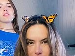 Alessandra Ambrosio and her 14-year old daughter Anja play with butterflies