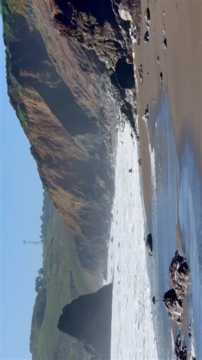 Nestled at the foot of the Marin Headlands, just a short drive from San Francisco, Rodeo Beach is a wild, windswept stretch of coastline where the Pacific Ocean meets the rugged cliffs of California’s northern shore. Known for its striking red and black sand—created by the erosion of volcanic rock—this beach offers an unspoiled, natural escape just minutes from the city. The beach is framed by towering cliffs, making it a favorite spot for surfers, nature enthusiasts, and photographers. Waves cr