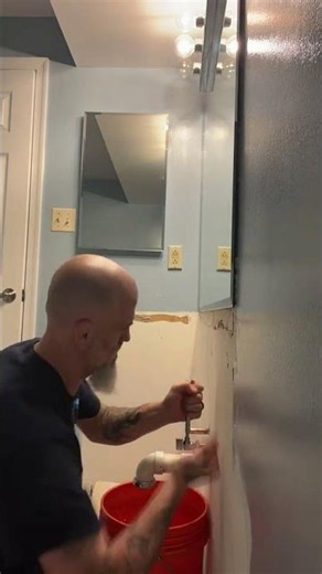 Leaking Shut-Off Valves Damaged This Bathroom Vanity