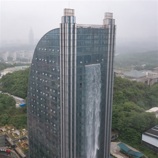 In Guiyang, Guizhou Province, a skyscraper is turning heads with an incredible feature: a waterfall cascading from its top! Dive into the breathtaking sights of this architectural wonder. #Travel #FunChina #LaborDay #YouthDay #Happy #Foryou | China Plus Culture