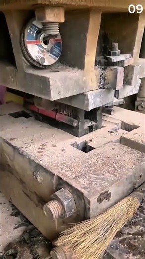 The process of molding sand into bricks using a press machine