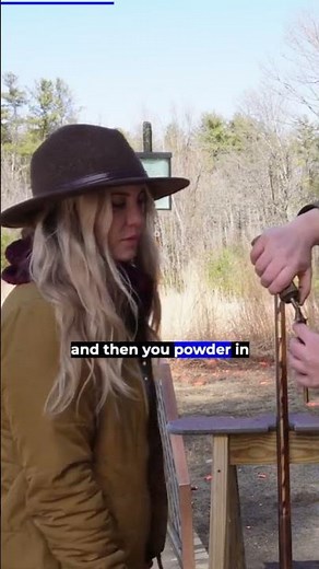 Explaining loading shot in a flintlock to a cute girl