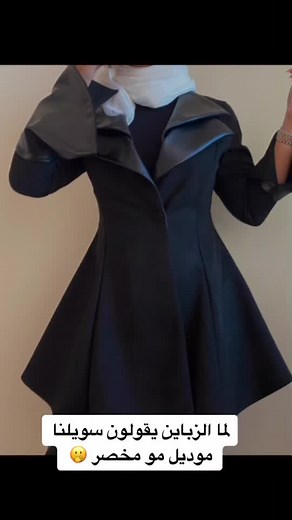 Stunning Outfit Showcase: Black Dress and Blue Coat Styles